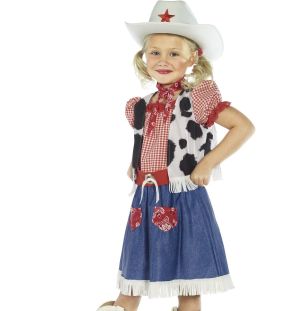 A little girl wearing a cowgirl sweetie costume